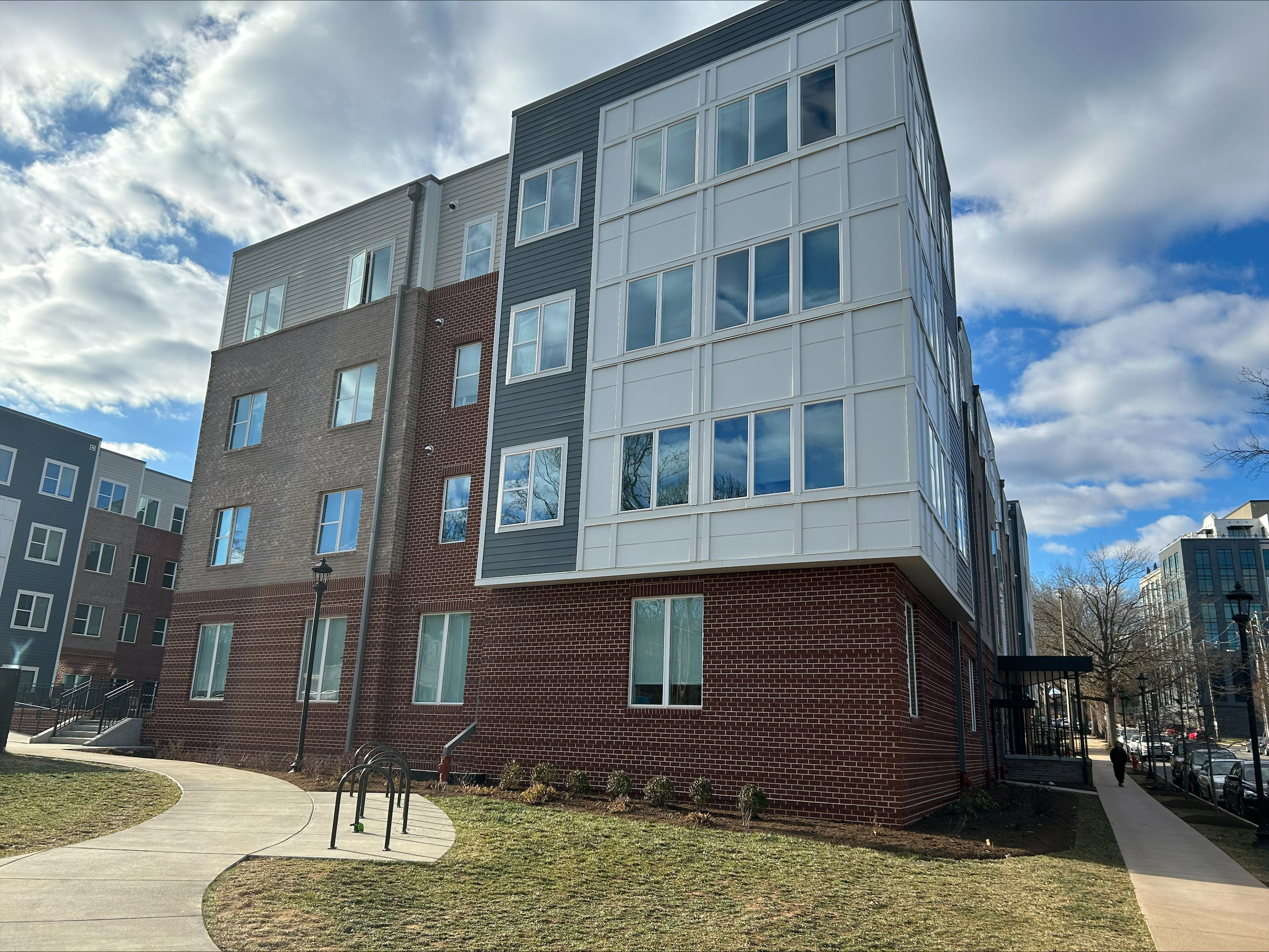 New apartment building with sidewalk