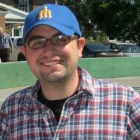 Caucasian with blue hat and plaid shirt