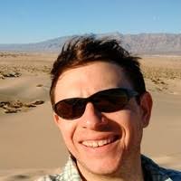 Brunette man with black sunglasses 